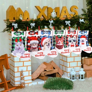 Christmas stockings for pets featuring cat and dog prints on a fireplace mantel