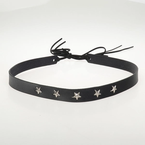 Detailed view of a black leather choker featuring five silver star metal studs and lace-up ties