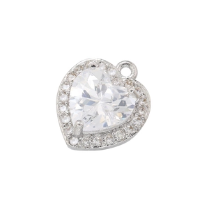 Macro detail of 18K gold plated heart pendant with sparkling clear cubic zirconia stones