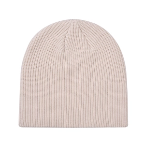 Close-up of beige knitted beanie showing thick vertical rib texture for winter warmth