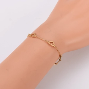 Minimalist 18K gold stainless steel bracelet featuring delicate sandblasted heart links