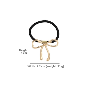Detail view of a 4cm golden alloy hollow bow hair tie with 7.1g lightweight design