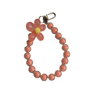 Pastel pink beaded flower phone strap with transparent candy beads and metal lobster clasp