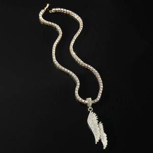Hip hop style gold angel wing pendant necklace with sparkling diamonds on black background