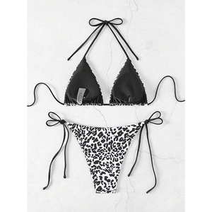 Detail of leopard print bikini bottom with removable pads and interior lining texture