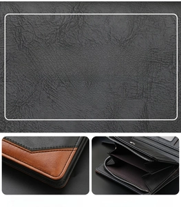 Detail view of leather texture and inner compartments of bifold wallet with card slots