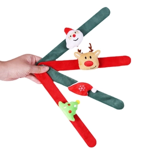 Set of four Christmas plush snap bracelets with Santa, reindeer, and tree designs