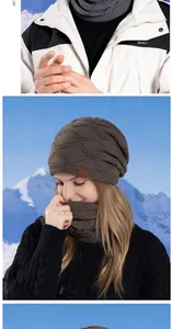 Detailed knit texture and mountain leather patch on dark coffee winter beanie hat