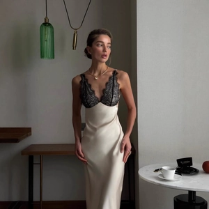 Elegant champagne silk slip dress with black lace trim and sexy side slit for women