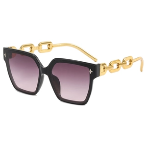 Modern oversized sunglasses with purple gradient lenses and gold chain link temples