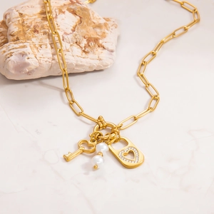 Minimalist stainless steel necklace with freshwater pearl and heart lock pendant