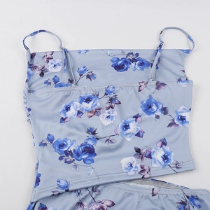 Detail of blue floral print camisole and matching skirt set with elastic polyester fabric