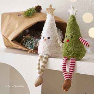 Christmas plush gnome ornaments set with green and white striped long legs on a desk