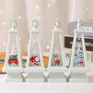 Set of four white LED Christmas lanterns with festive illustrations and hanging rings