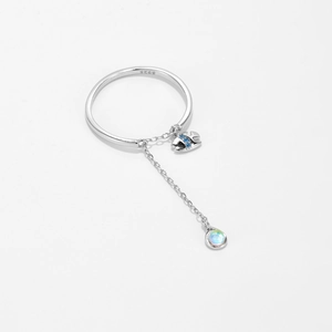 S925 sterling silver chain ring with opal and blue crystal charms on white background