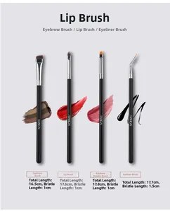 Detailed view of four professional makeup brushes with cosmetic product textures and sizes