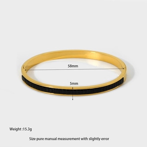 Detail view of 18k gold plated bangle showing 58mm diameter and 5mm width specifications