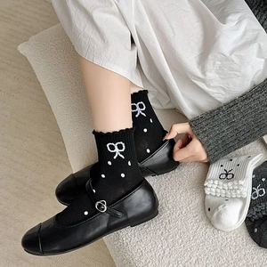 Vintage style polka dot lace bow crew socks for women in black white and grey