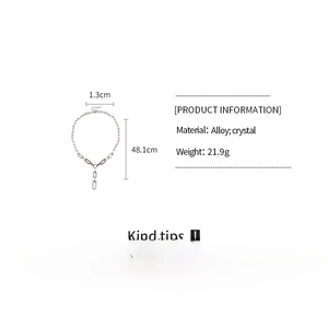 Detailed size and material specification chart for the silver-tone crystal sweater necklace