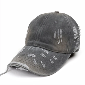 Close-up of charcoal grey washed baseball cap with distressed holes and white embroidery