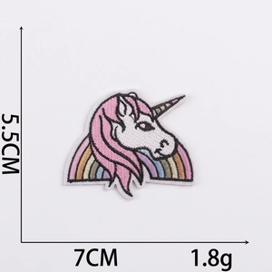 Detailed size view of cartoon rainbow unicorn embroidery patch measuring 5.5cm by 7cm