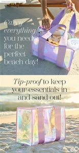 Detailed view of spacious iridescent PVC beach tote bag with lavender straps on sand