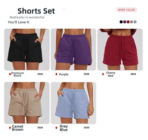Macro shot of cotton drawstring sweat shorts in various colors with side pockets and elastic waist