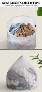 Detail of large fine mesh laundry bag with black drawstring closure for washing machines