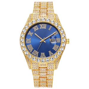 Macro view of luxury men's gold watch with blue dial and diamond-set Roman numerals