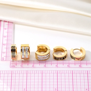 Five-piece set of gold stainless steel huggie earrings with roman numerals and zircons