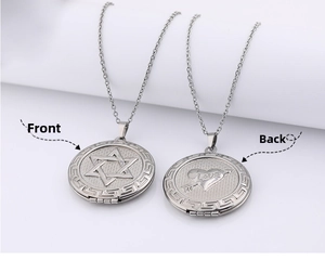 Detailed front and back view of silver heart locket pendant with engraved LOVE and star motifs