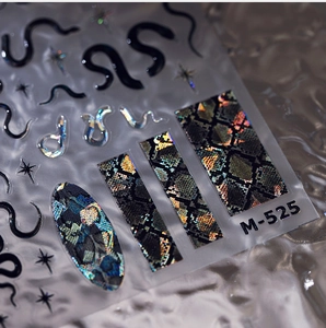 Macro shot of M-525 nail art stickers with laser snake patterns and holographic effects