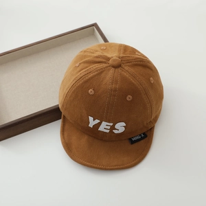 Brown soft-top baby baseball cap with white YES embroidery and short brim for infants