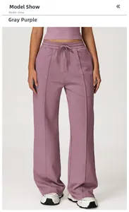 Detail of high waist grey-purple wide-leg sweatpants with drawstring and vertical seam