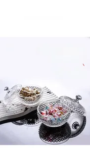 Detail of European glass candy jar with diamond texture, lid handle, and thick walls