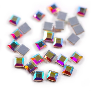 Macro shot of square AB crystal rhinestones with multifaceted cut and colorful glow