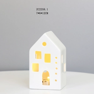 Detailed view of white ceramic house LED night light with 7x6x12CM size markings