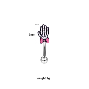 Detail showing skull hand with pink bow design on 9mm stainless steel body jewelry