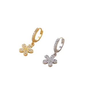 Silver and gold hoop earrings with sparkling five-petal flower zircon charms on white background