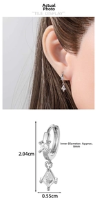 Detail view of square zircon drop earrings with size measurements of 8mm inner diameter