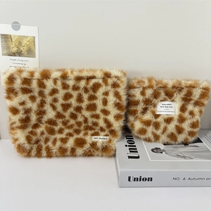 Plush leopard print cosmetic bags in large and small sizes with soft faux fur texture