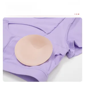 Dettaglio del top sportivo viola con tessuto traspirante e imbottiture XS rimovibili