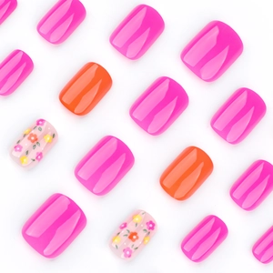 Short square press-on nails with colorful floral patterns and vibrant warm-toned finishes
