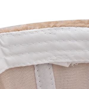 Detailed macro view of beige faux fur lining and breathable honeycomb mesh fabric