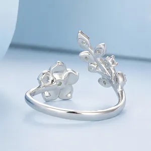 Adjustable S925 sterling silver ring with gradient pink cherry blossom and leaf motifs