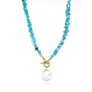 Bohemian turquoise gravel necklace featuring a white baroque pearl pendant and toggle clasp