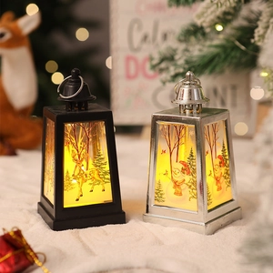 Detail of Christmas lantern with deer pattern and warm LED light in a festive setting