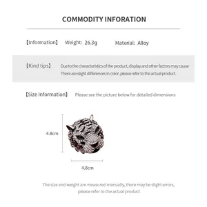 Detailed view showing tiger head brooch dimensions 4.8cm and 26.3g weight specifications