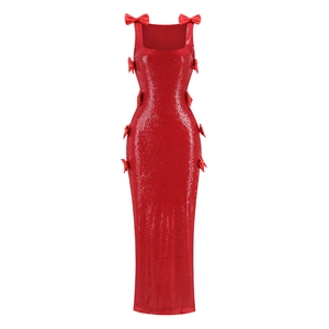 Detail of red sequin dress featuring square neckline and delicate side bow accents