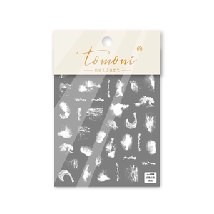 Detailansicht der Tomoni Nageltattoo-Sticker mit weißen Wolken- und Wellenmotiven auf Folie